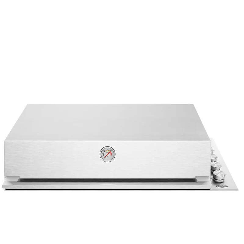 BeefEater ProLine 6-burner built-in gas barbecue in stainless steel with its hood closed, a lid thermometer and control knobs on the right