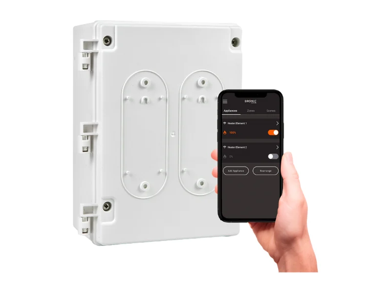 Bromic Affinity On/Off controller in its white weatherproof housing, beside a phone switching heaters on and off in the Bromic Smart-Heat app