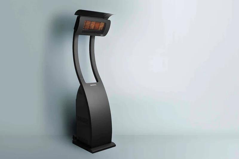 Black Bromic Tungsten Smart-Heat Portable gas heater on its curved stand, on a pale grey studio background