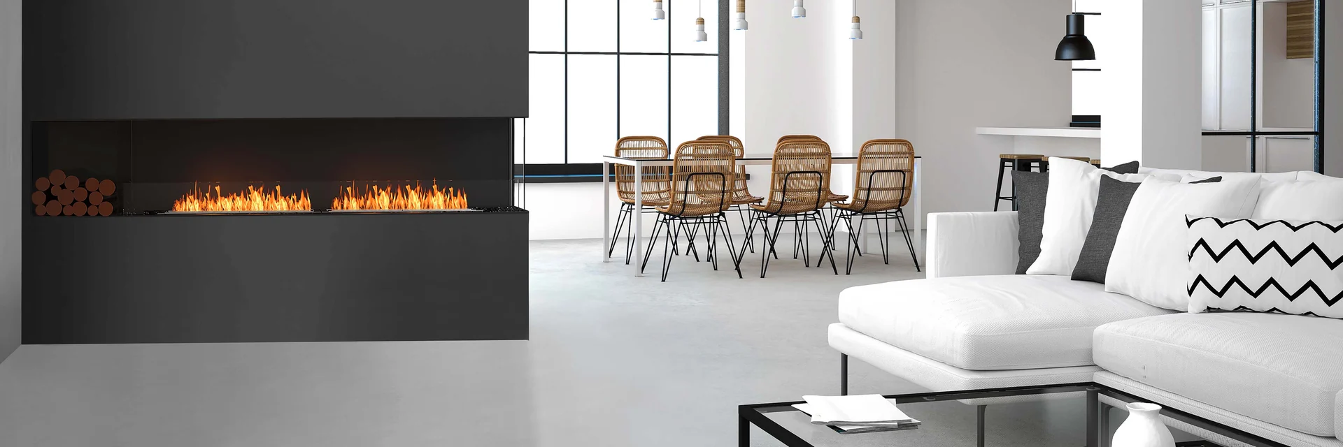 EcoSmart Fire Flex corner fireplace burning in a dark wall of a loft with tall windows, a dining table and a white sofa