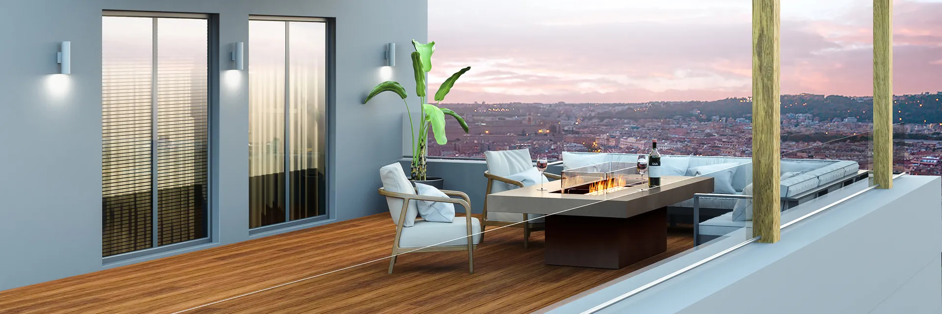 EcoSmart Gin 90 Dining fire table with chairs on the deck of a house with a pergola, overlooking hills at dusk