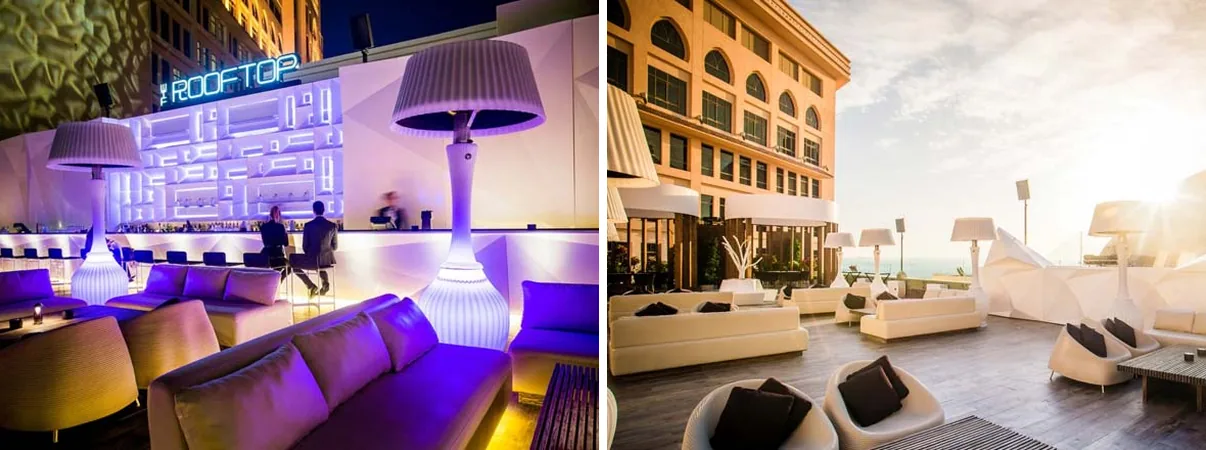 Lamp-style Kindle Living heaters on the rooftop lounge of the St. Regis Doha, at night and at sunset
