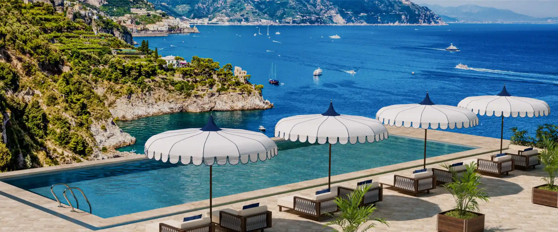 Four Tuuci Ocean Master M1 Voilare center post parasols with scalloped white canopies along a clifftop swimming pool, overlooking a blue bay dotted with boats