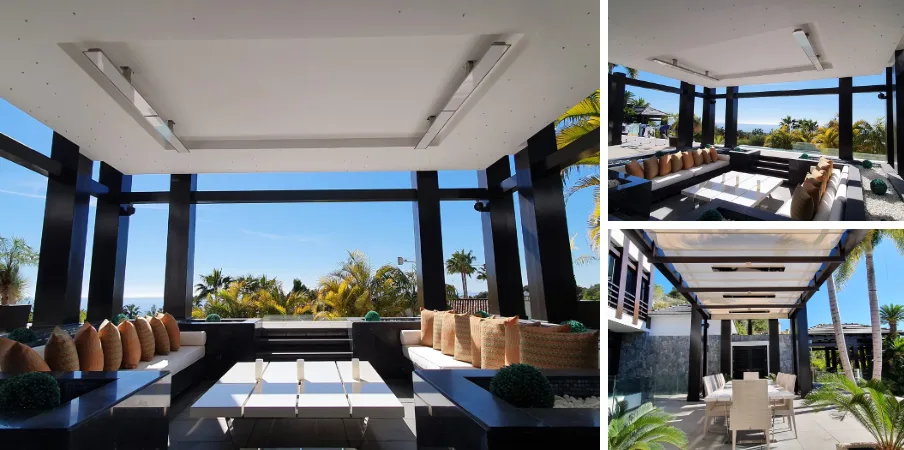 Bromic Platinum Electric heaters in black and white over a lounge area and a pergola with a dining table at a villa in Cascada de Camoján, Marbella